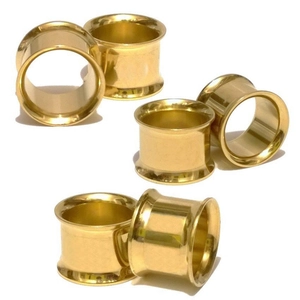 Polished gold stainless steel ear tunnels with double flared saddle design for ear gauging