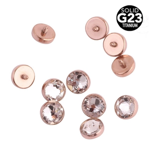 Rose gold G23 titanium dermal anchor with round clear crystal and threaded interface