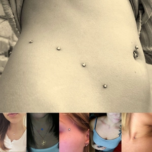 Titanium skin diver microdermal piercings shown on body areas like collarbone and neck