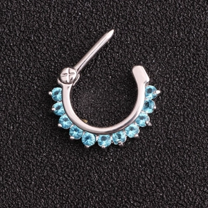 Polished silver septum clicker ring with eleven shimmering light blue zircon stones