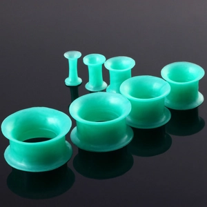 6-delige mintgroene siliconen oor tunnels set voor body piercing in diverse maten