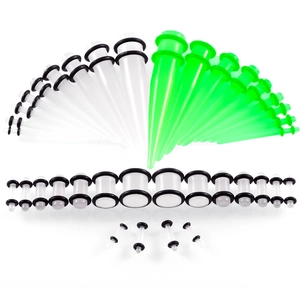 Makro-Detail des Acryl-Ohrdehner-Sets mit Tunnels und Stäben in Neongrün und Weiß