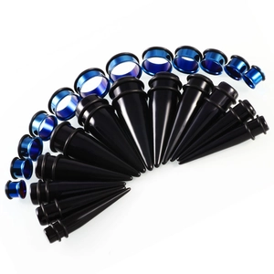 Detail view of black acrylic tapers and blue stainless steel tunnels ear stretching kit