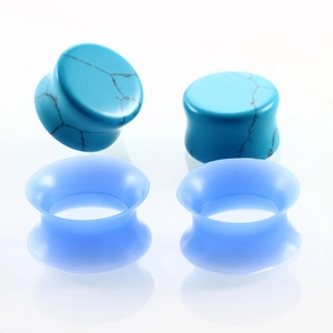 20pcs set of silicone ear tunnels and turquoise stone gauges on white background