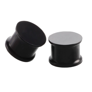 Solid black silicone ear plugs with a polished finish for ear stretching and tunnels