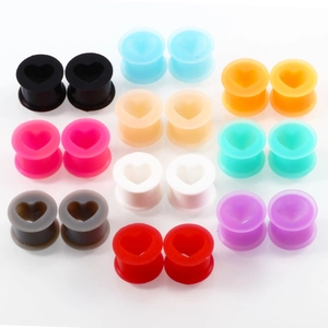 Set of ten colorful heart-shaped silicone flesh tunnels for ear stretching and piercing