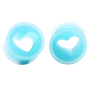 Close-up of heart-shaped hollow tunnels in light blue silicone for ear stretching