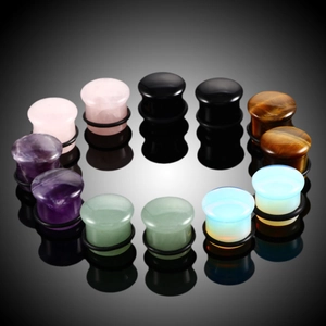 Natural stone ear plugs set featuring amethyst and tiger eye with black O-rings