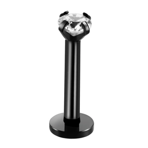 Close-up of black surgical steel lip stud with a clear round four-claw zircon inlay