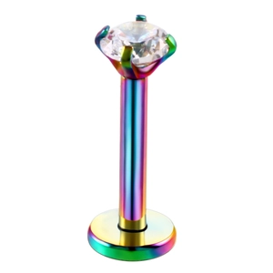 Macro detail of rainbow plated stainless steel labret stud with a clear zircon stone
