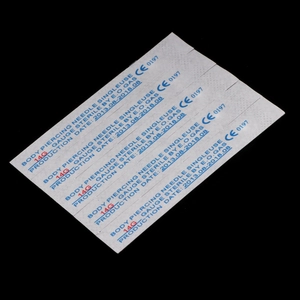 Close-up of 14G sterile body piercing needles in EO gas protective packaging