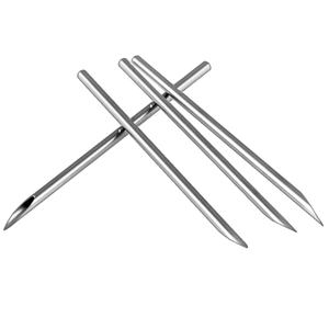 Detail of three professional disposable stainless steel piercing needles with sharp bevel tips