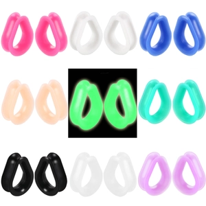 Teardrop silicone ear gauge plugs set in nine colors including glow-in-the-dark green