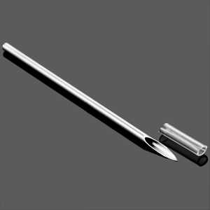 Macro shot of stainless steel piercing needle with sharp bevel tip and protective cap