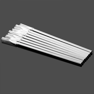 Close-up of 10 disposable sterile body piercing needles with transparent protective caps