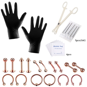 28-delige body piercing set met 16G naalden, klemmen en roségouden lichaamsjuwelen