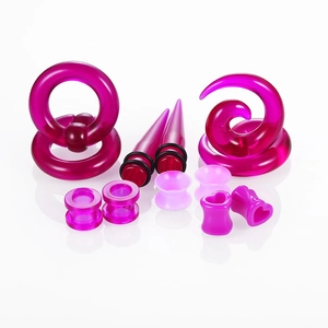 Gedetailleerde set van paarse en roze acryl oorexpander met spiraalvormige tapers en tunnels