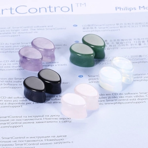 5 pairs of teardrop natural stone ear plugs and gauges in assorted organic colors