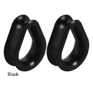 Pair of black teardrop silicone ear gauges with a smooth matte finish on white background