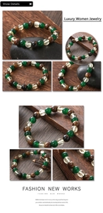 Detailed view of handmade beaded bracelet with green agate and tiger eye natural stones