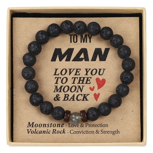 Detail view of men's volcanic stone bracelet with moonstone bead in a gift box