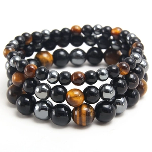 Three-piece beaded bracelet set featuring natural tiger eye, obsidian, and hematite stones