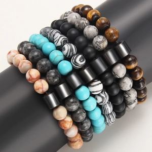 8mm natural tiger eye and hematite beaded elastic bracelet set on a display stand