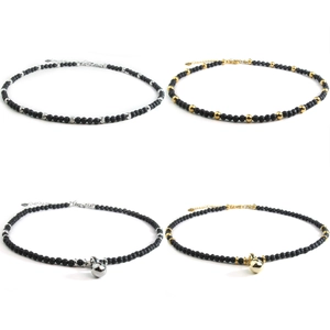Lava stone and pearl beaded necklace with metallic sphere pendants in silver and gold