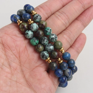 Handheld set of Lapis Lazuli and African Turquoise beaded bracelets with gold accents