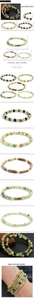 Macro detail of prehnite and natural stone beaded bracelets with vintage metal accents