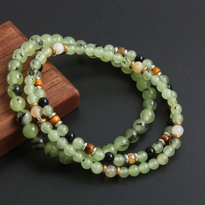 Dual stackable natural prehnite and jasper beaded bracelets with zen style metallic accents