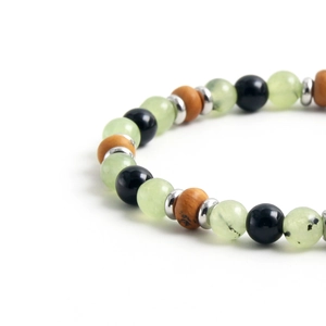 Natural prehnite and picture stone beaded bracelet with vintage silver spacers on white