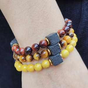 Dreiteiliges Set aus Tigerauge und Lavastein Perlenarmbändern für Damen und Herren