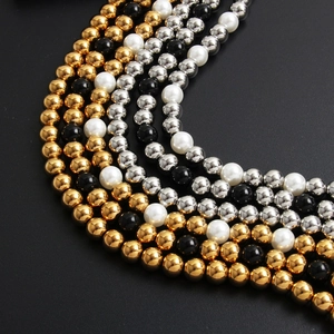 Elegant multi-layered necklace with 4-10mm white pearls and gold-plated steel beads