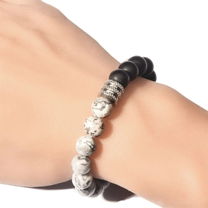 Elastic beaded bracelet with matte black beads and white marble stones for men and women