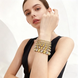 Bracelets multicouches à perles bicolores or et argent avec effet de coupe facetté