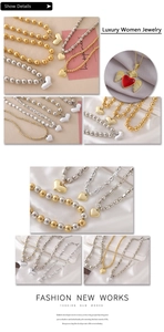 Detailed views of punk heart pendant necklaces with gold beads and enamel wings