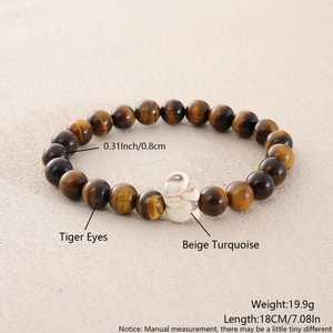 Detail view of 8mm tiger eye stone bracelet with size labels showing 18cm length and weight