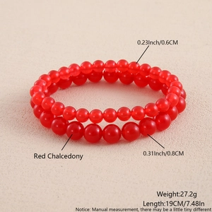Detail view of red chalcedony bead bracelets in 6mm and 8mm sizes with smooth finish