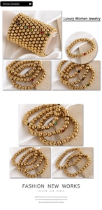 Detail showing 18K gold-plated beaded bracelets with colorful rhinestones on silk