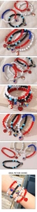 Detail of USA flag heart charms and mixed color beads bracelets for Independence Day