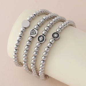 Set aus 4 silbernen Edelstahl-Perlenarmbändern mit Lotus- und Sonnen-Charm-Anhängern