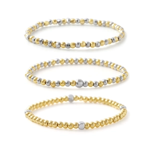Minimalistisches Armbandset aus Gold- und Silberperlen mit facettierten Metallperlen