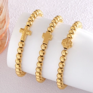 Ensemble de trois bracelets en perles dorées en acier inoxydable avec pendentifs croix