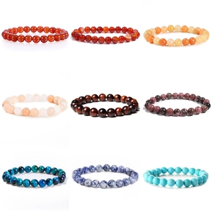 Set de nueve pulseras elásticas de cuentas de piedra natural de 6mm y ojo de tigre