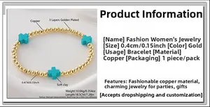 Detalle de pulsera de cuentas de 18,5cm con esferas de cobre dorado y cruces de arcilla