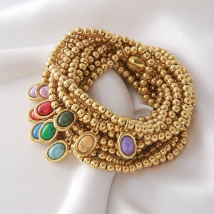 Gold-plated stainless steel beaded bracelet set with vibrant natural birthstone pendants
