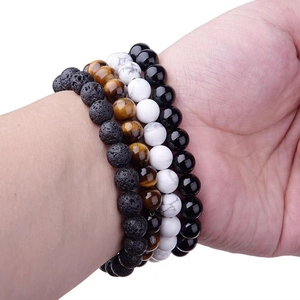 Stack of 8mm natural lava rock, tiger eye, turquoise and obsidian beaded elastic bracelets