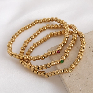 Bracelets en perles d'acier doré avec des charmes de pierres de naissance colorées