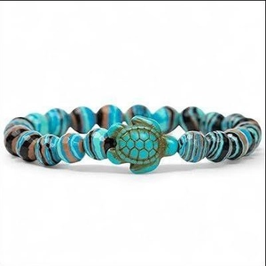 Bracciale tartaruga marina con perline in pietra turchese e venature naturali